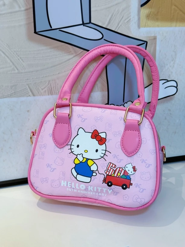 46675粉色KT手拎斜挎包