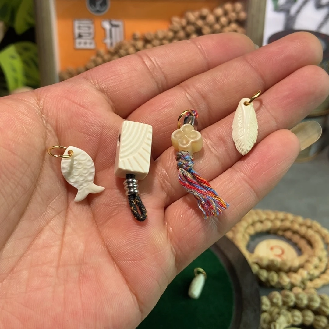 枷***锁吊坠柏香籽/百香籽
