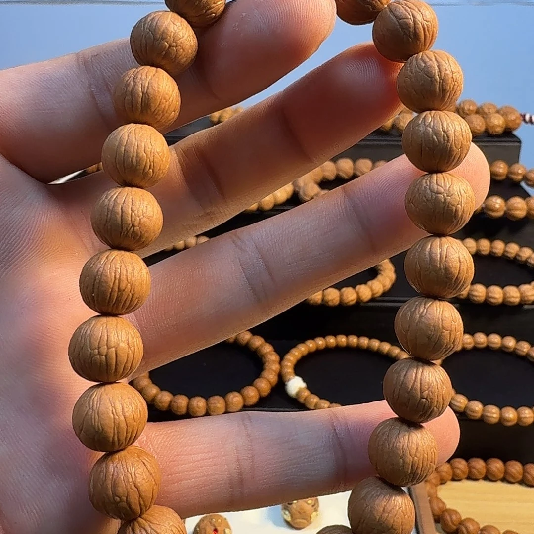 ***⠀吊坠猴头核桃凤羽