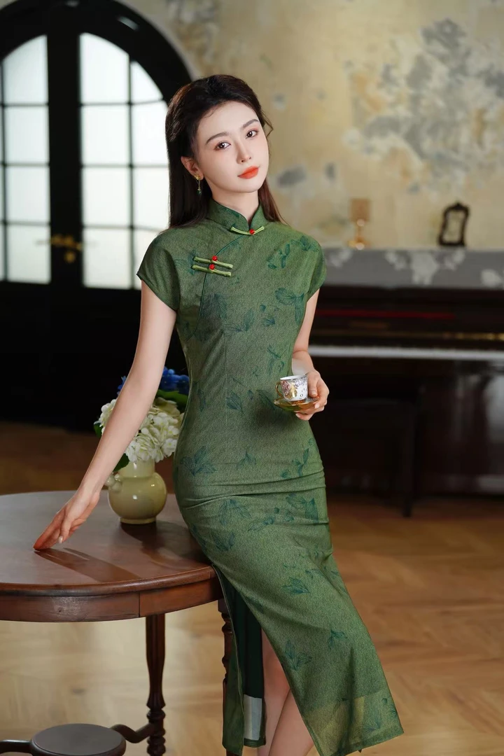 绿色旗袍中式改良2025年轻无袖新款复古气质夏季连衣裙国风细腰长