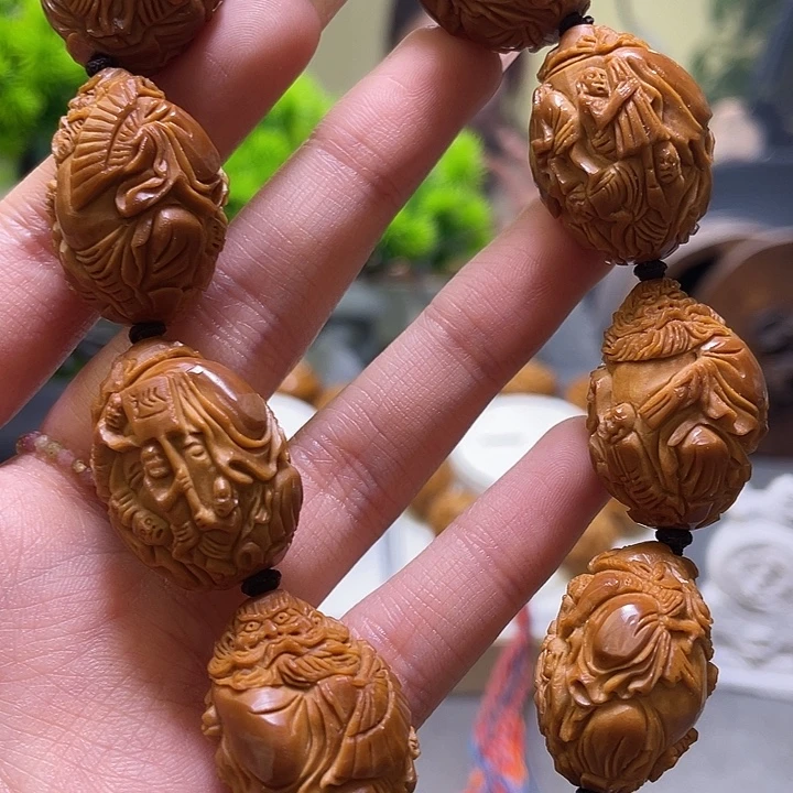 小****橄榄核吊坠橄榄核雕