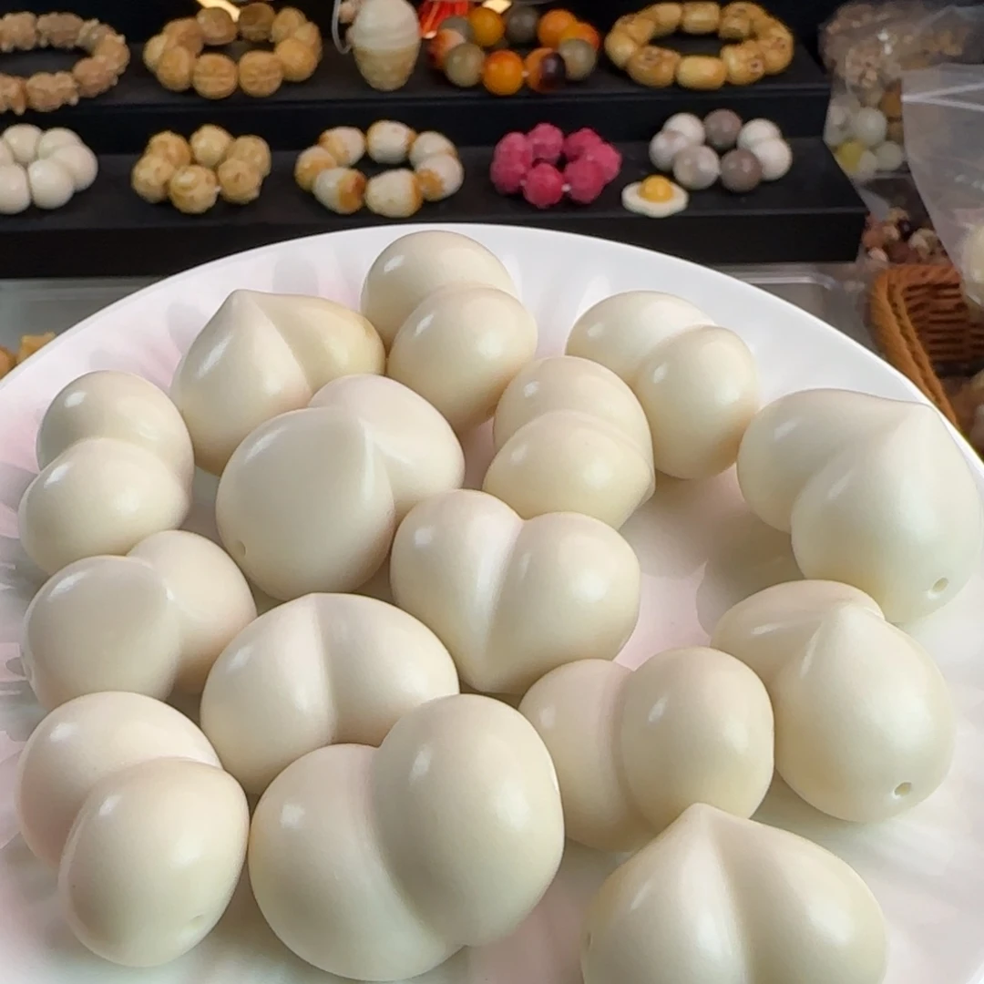 菩提根/象牙果手串微瑕疵恒孔卡30光面屁桃3颗