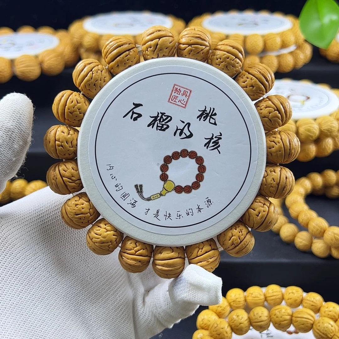 毛***娃手串桃核金鱼肚桃核手串