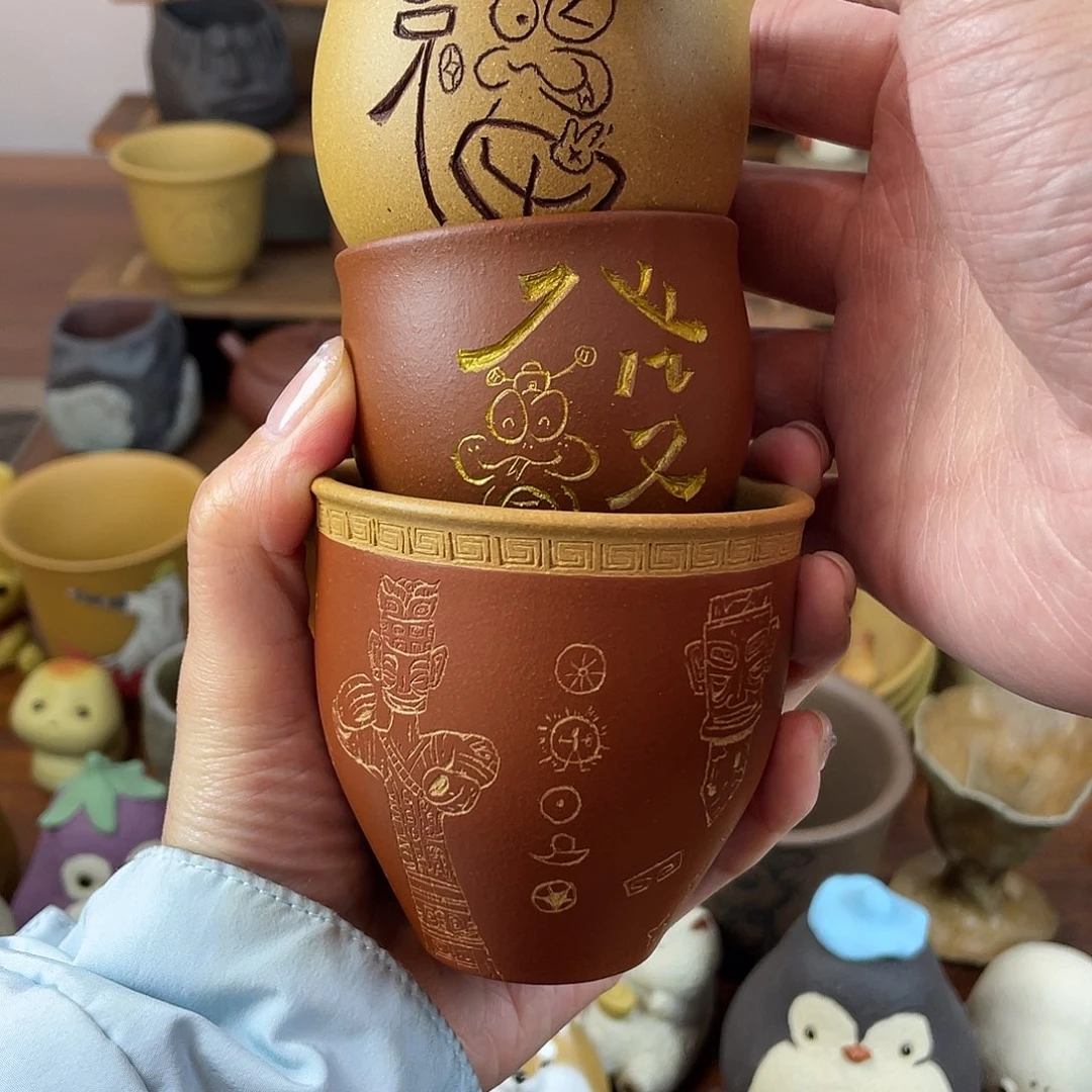 紫砂茶宠小**。茶杯3个