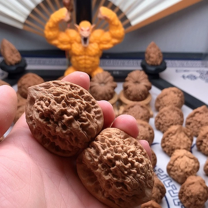 万***力桃核吊坠山地果官帽