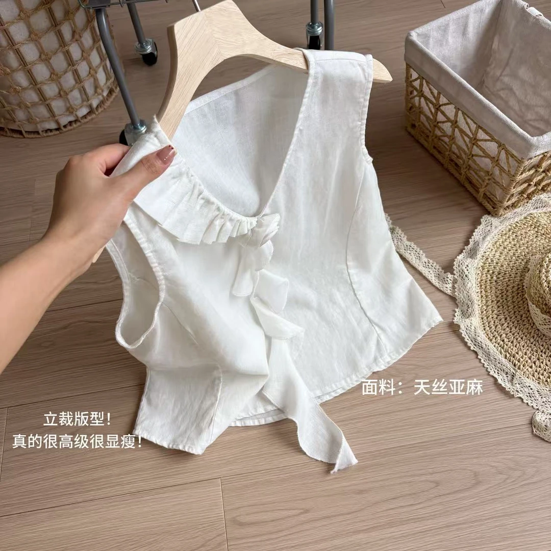 小柒家A00257-夏季新款小众荷叶领气质甜美简约纯色无袖白色衬衫