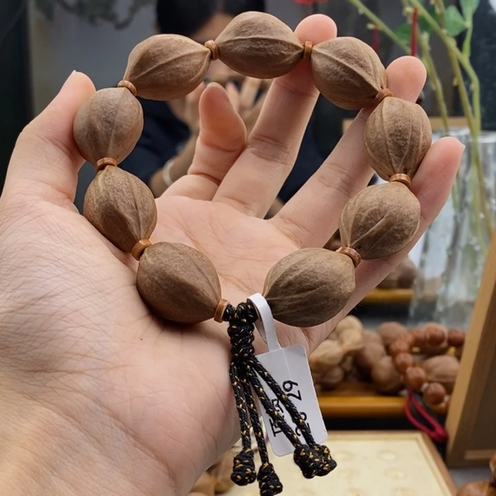 吊坠橄榄核百*梅林铁