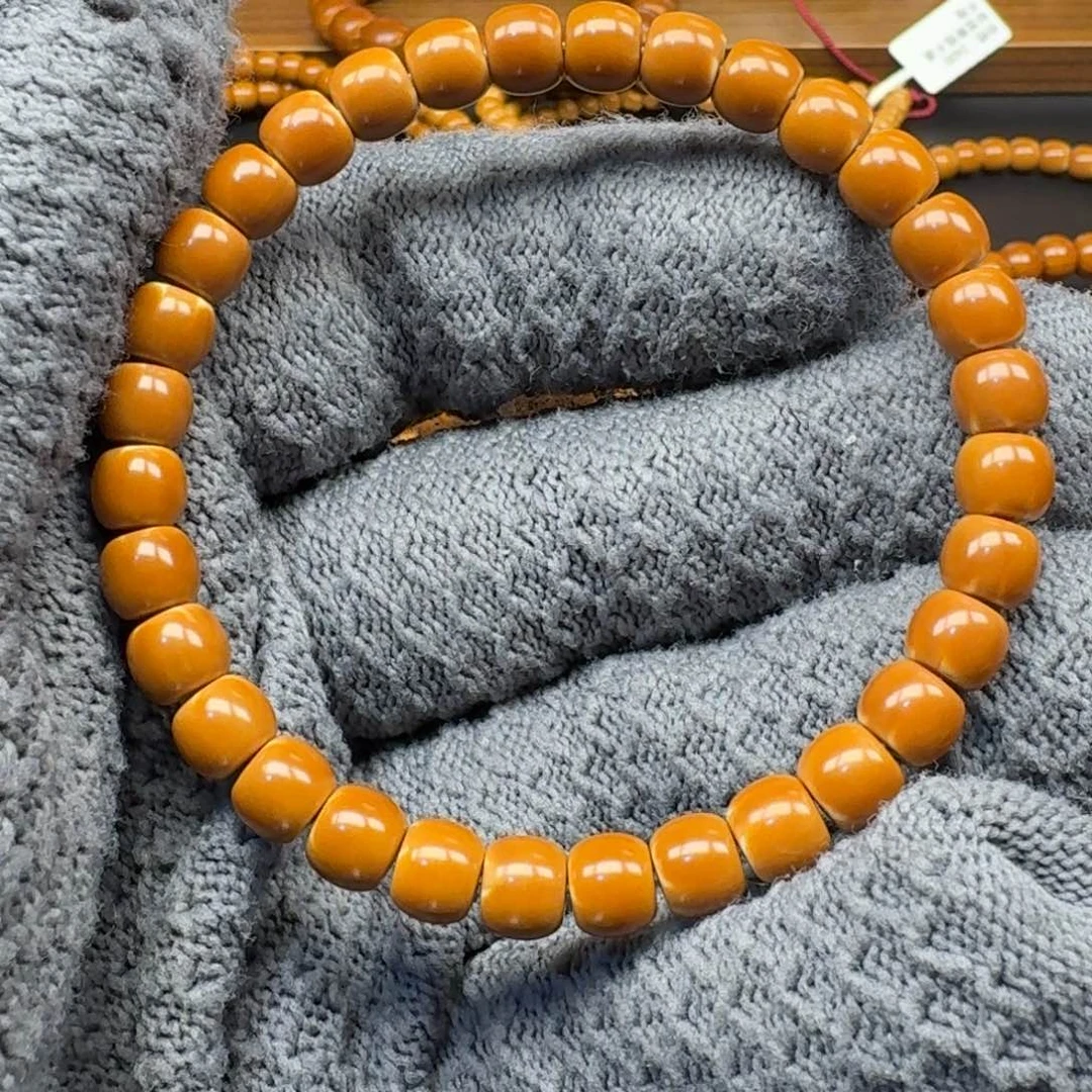 小***@手串/手链橄榄核7.0➕老挝正三花核尖单圈微白