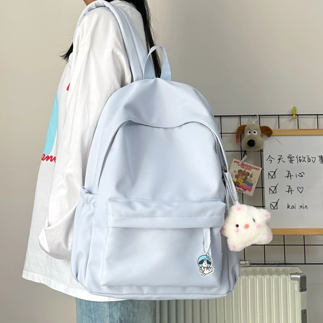 书包女韩版ins清新纯色大容量背包简约百搭初中生高中学生双肩包