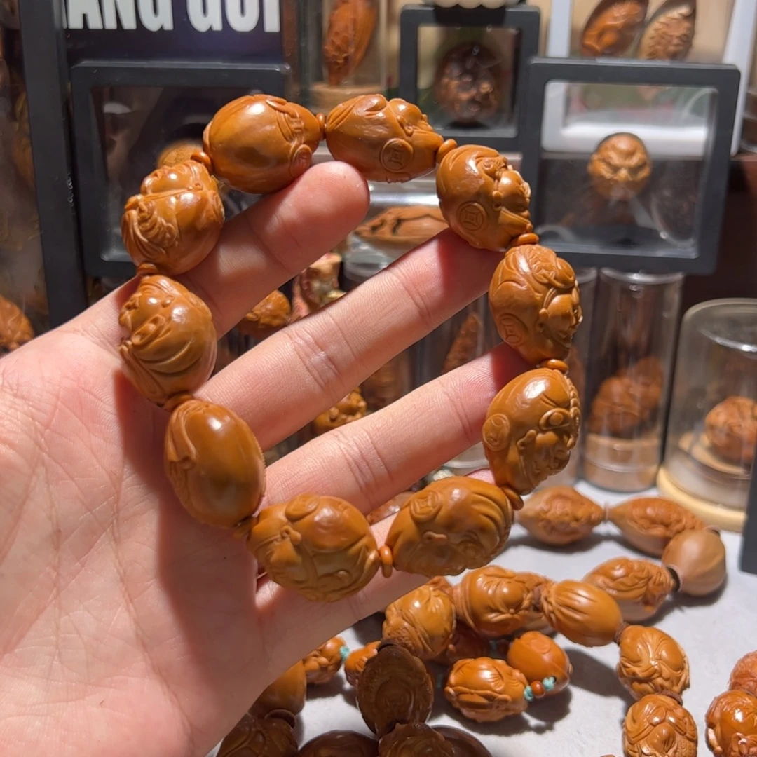 杨***迟橄榄核手串/手链手工八宝财神➕籽