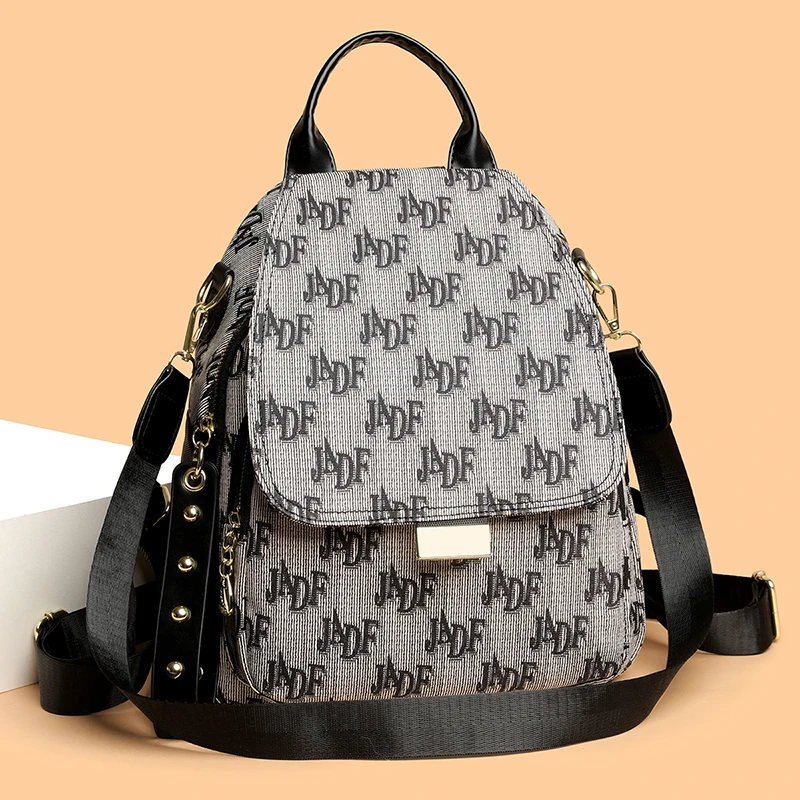 双肩包女士2025新款日韩背包绣花时尚百搭包单双两用轻便旅行书包