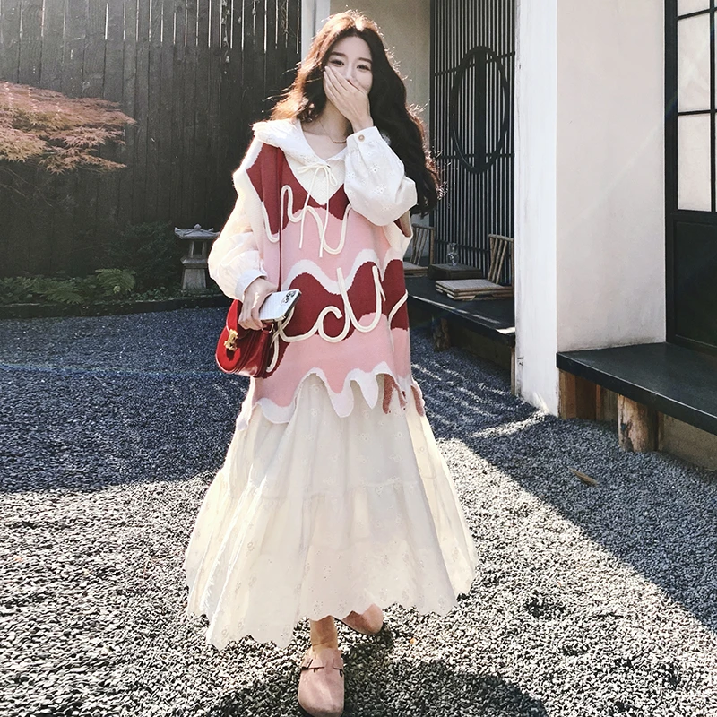 粉色不规则针织马甲连衣裙套装女春2025新款森系设计感长裙两件套