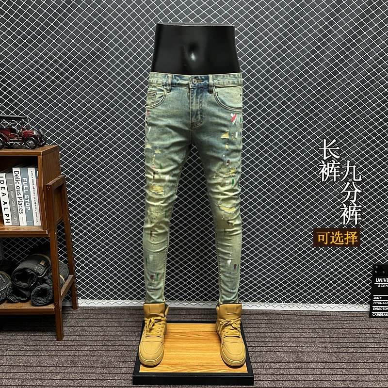 春夏新款男士牛仔裤修身小脚裤潮流复古破洞个性泼墨弹力九分长裤
