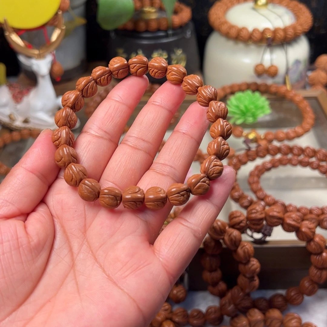 莉****桃核手串玉龙脊手串10