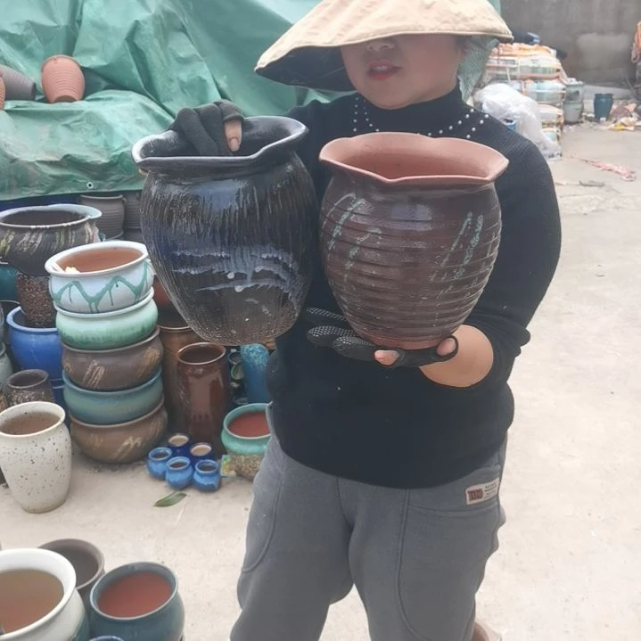 红陶瑕疵两个盆子。