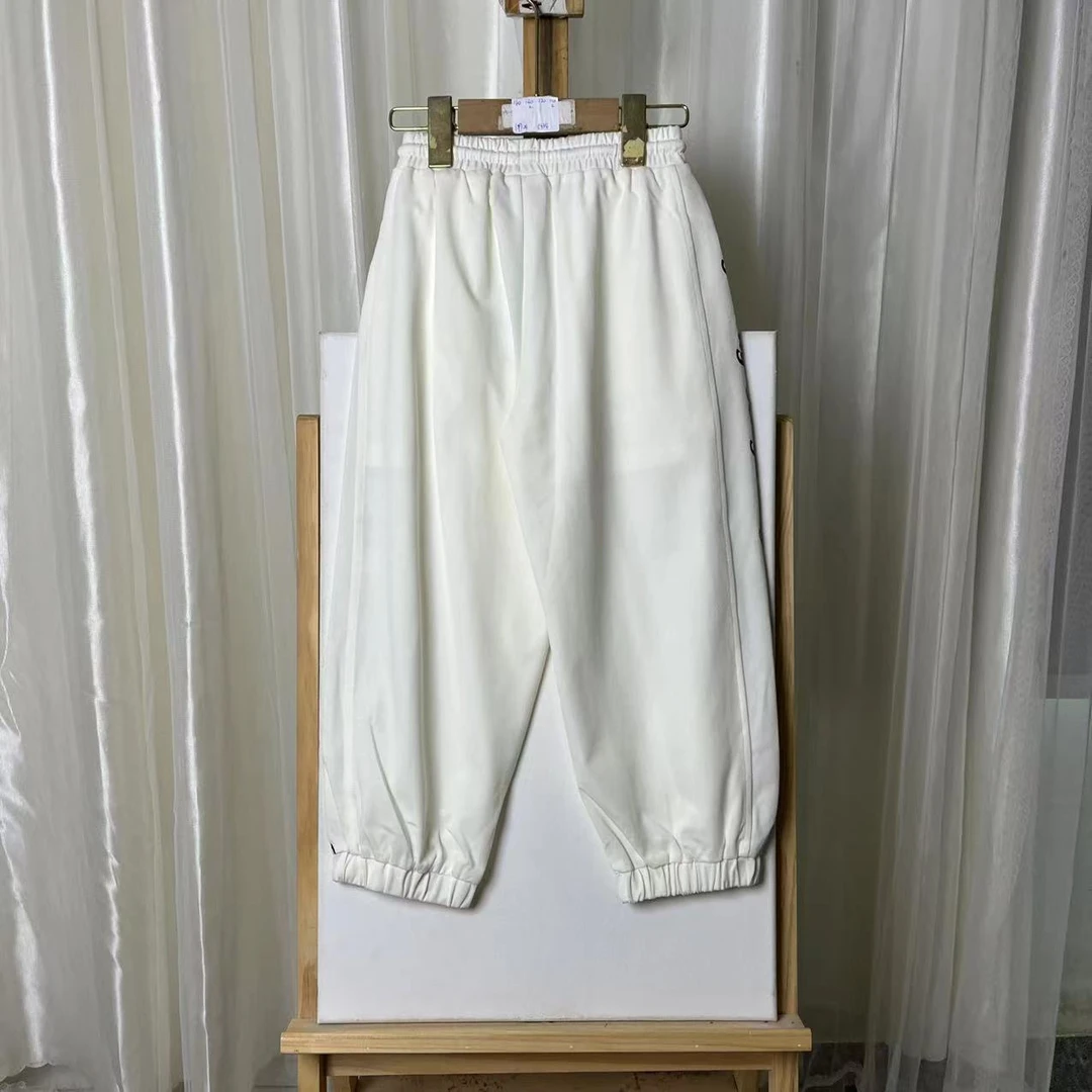 695白色裤子8984