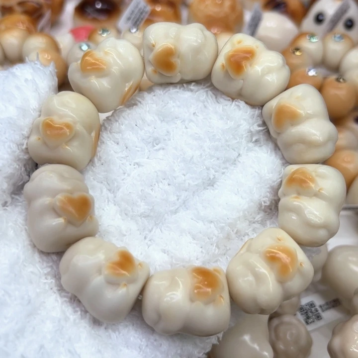 白玉菩提把件76 象牙果原果雕刻炭烧爱心兔子微瑕