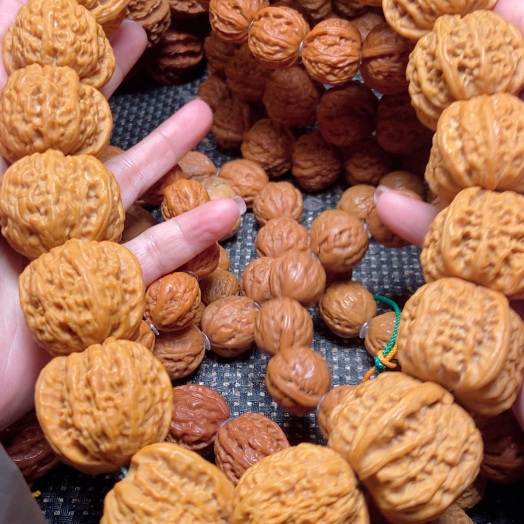 吊坠桃核白狮子麻核桃手持