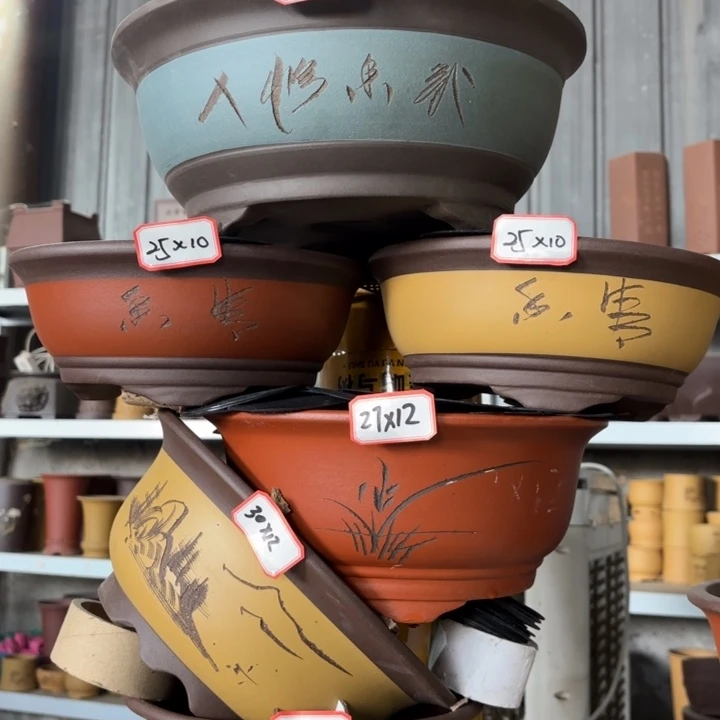 紫砂花盆100-6。