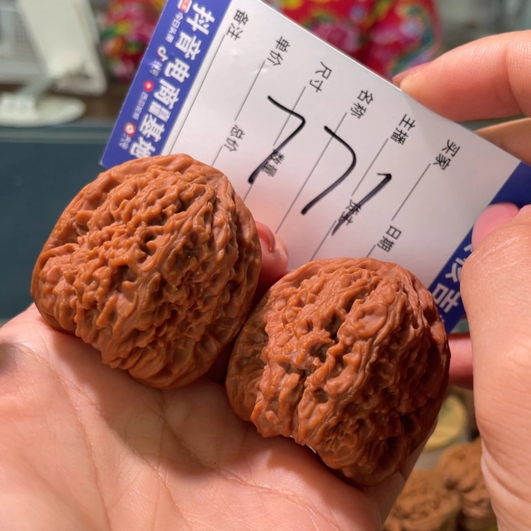 核桃把件39左右高炮红皮南将石