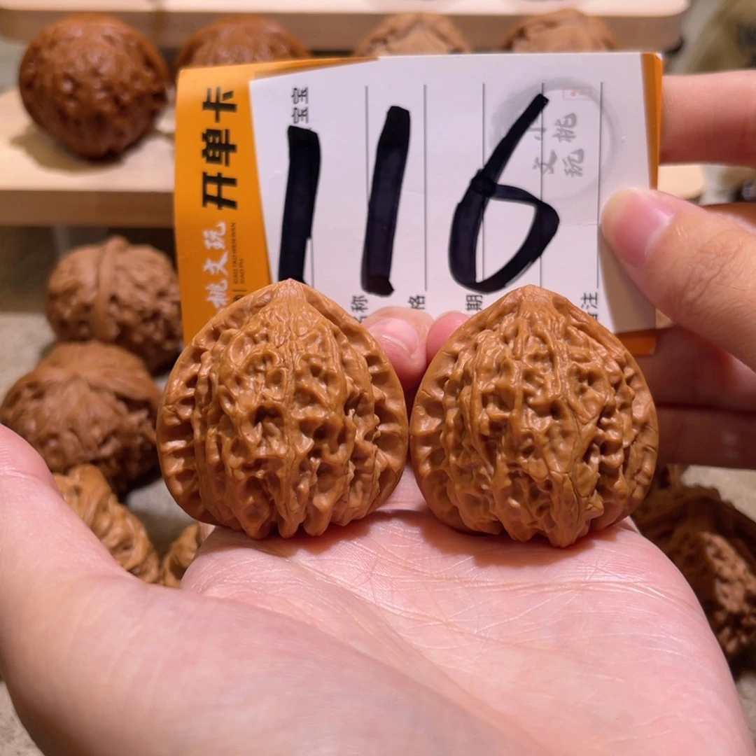 文玩核桃把件38金牛