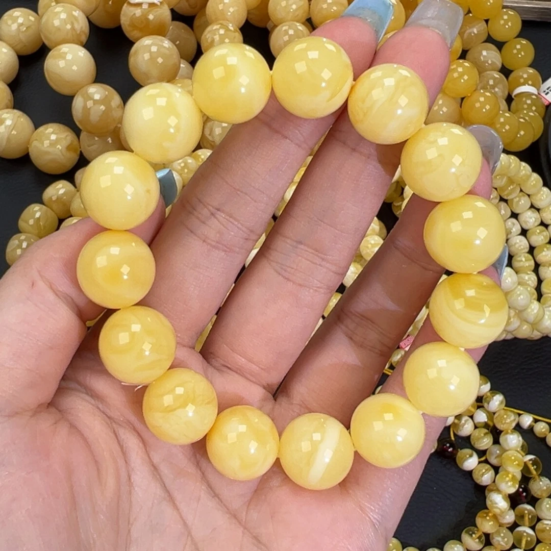 琥珀未镶嵌手链24.4黄白妖花