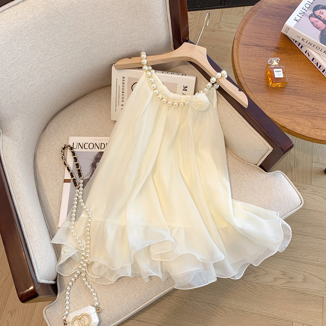 法式设计感小众休闲女装挂脖珍珠拼接荷叶边下摆衬衫夏季新款上衣