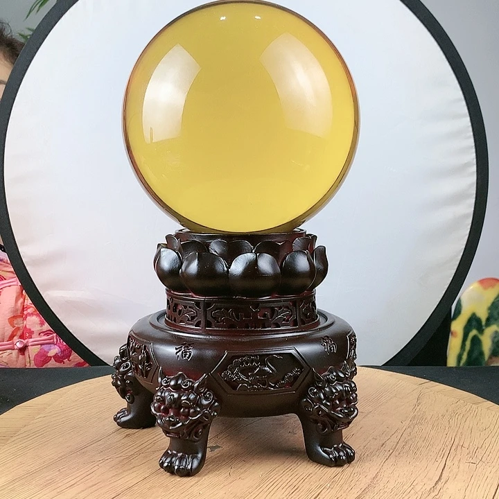 石材黄水晶球直径20带高档底座