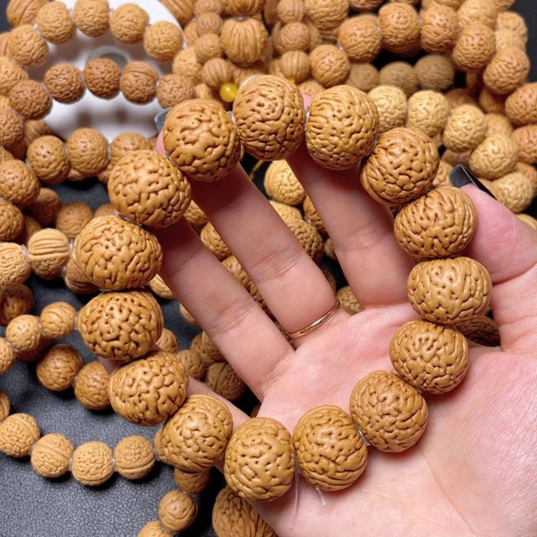 依***舍手串桃核苹果手串