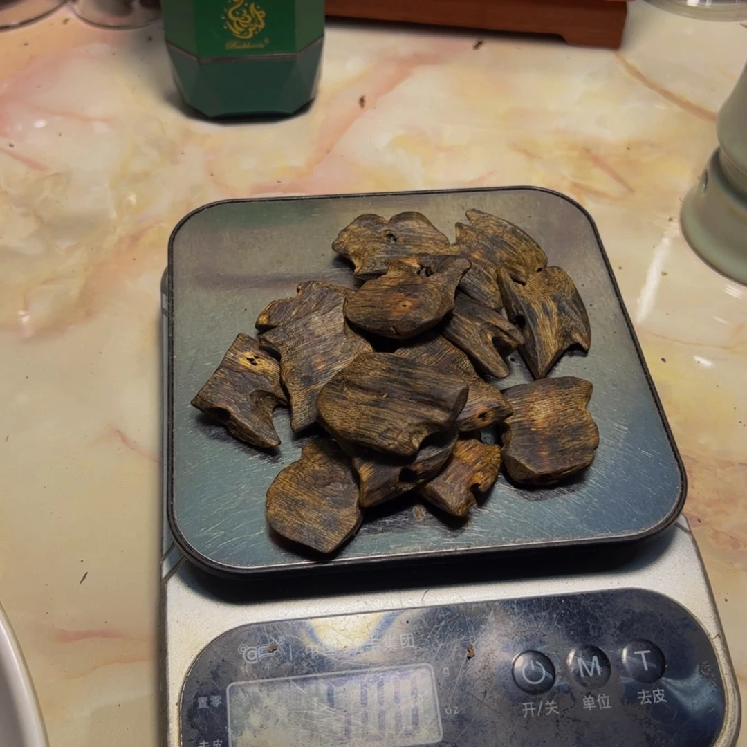 沉香木手把件张****手沉香高油块料