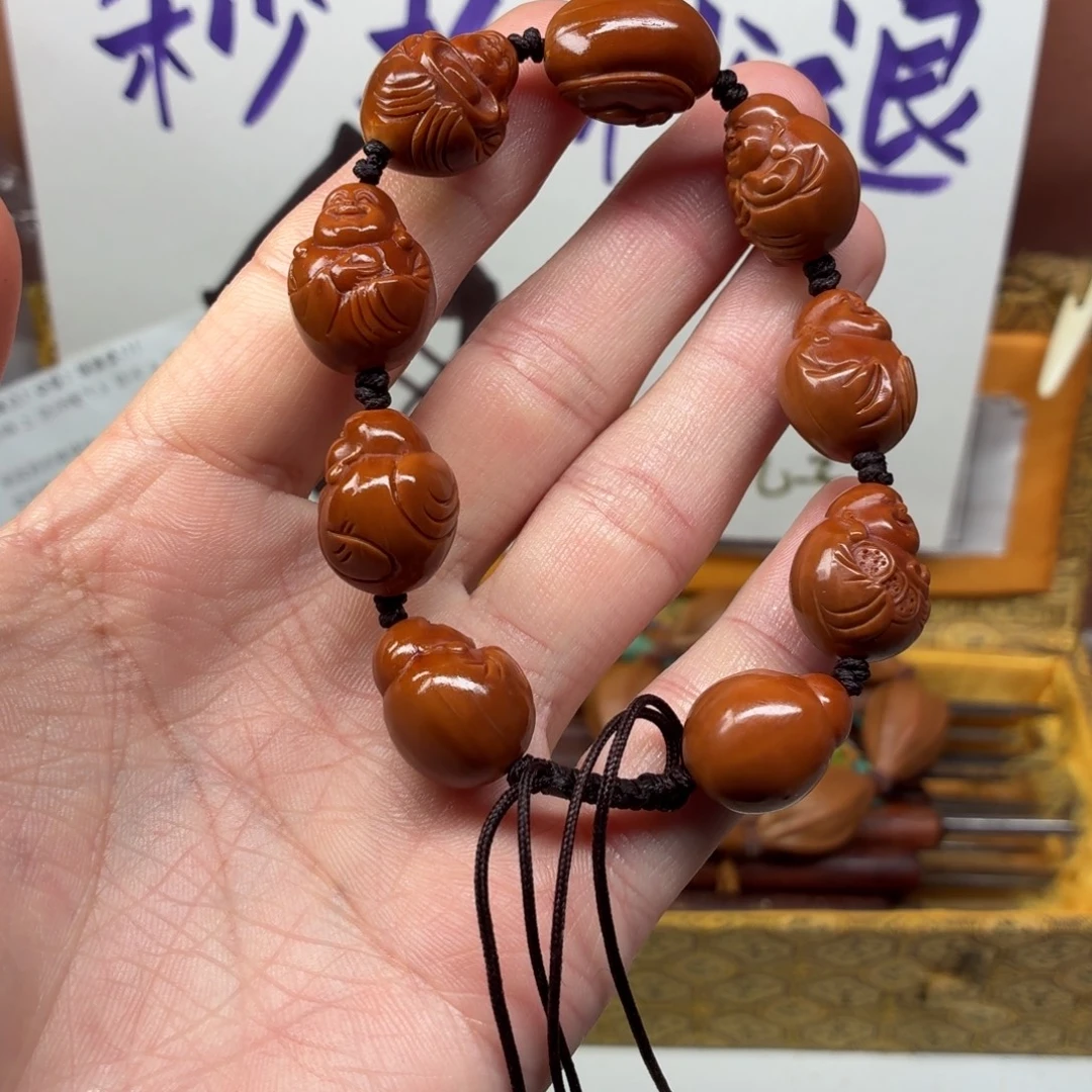 吊坠橄榄核精抛光红弥勒