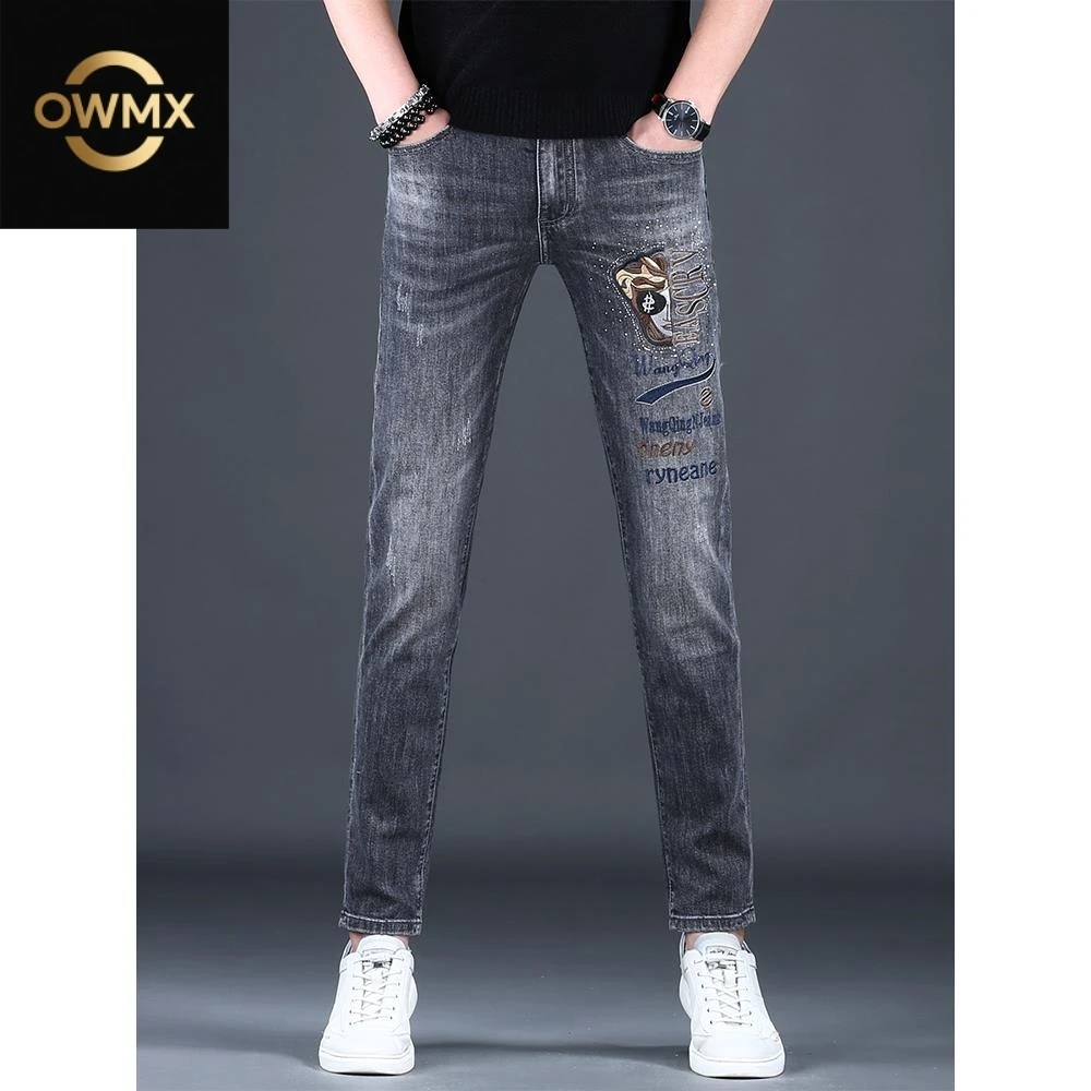 高端男款牛仔裤春秋潮流修身小脚百搭刺绣男士弹力休闲潮流男裤子