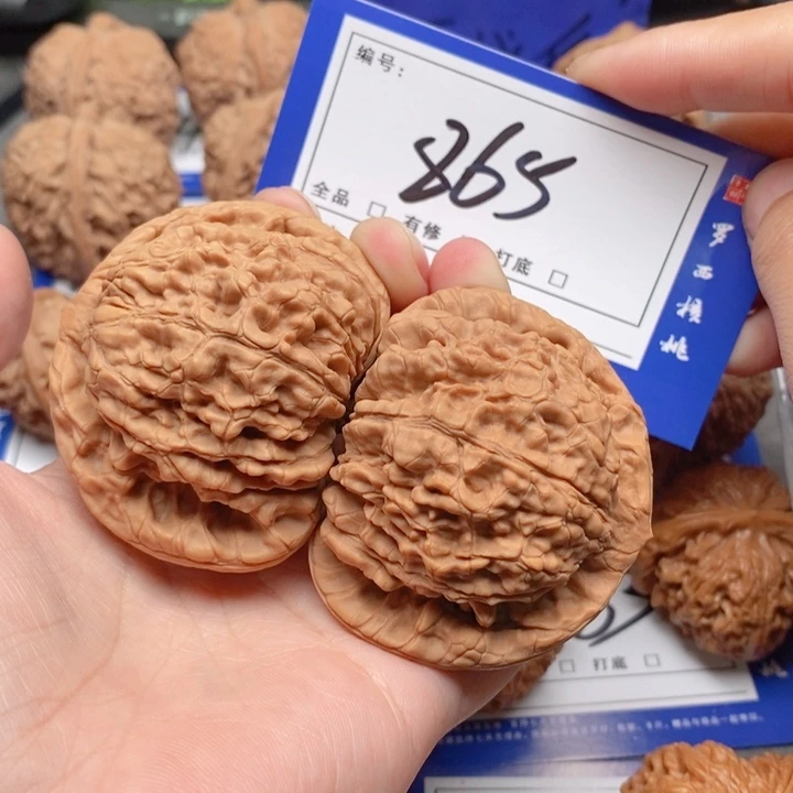 把件桃核讓***粹54官帽865号牌