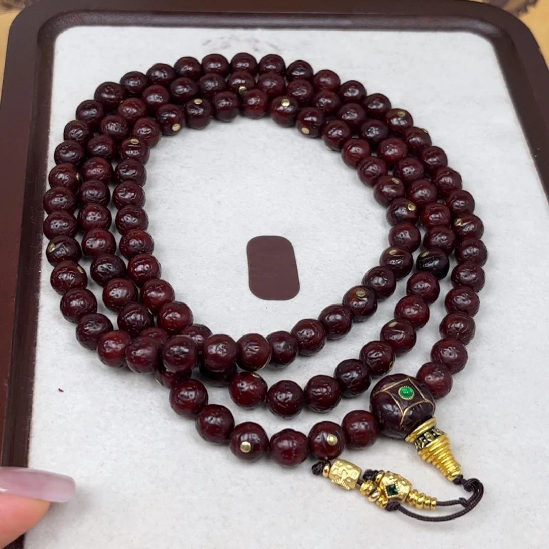 你***谁凤眼菩提吊坠凤眼