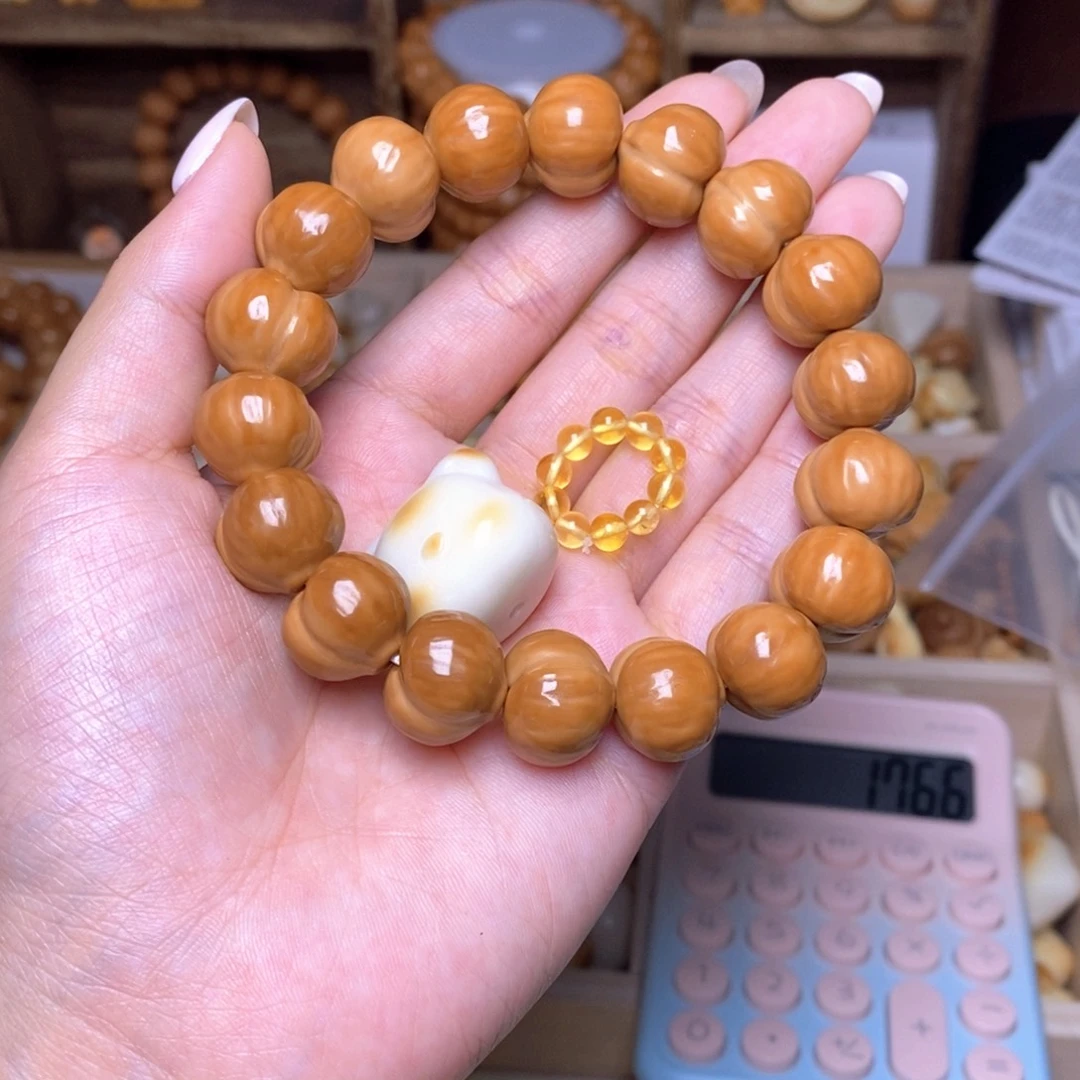 梦***颜猴头核桃吊坠15屁桃,熊头,蜜卡