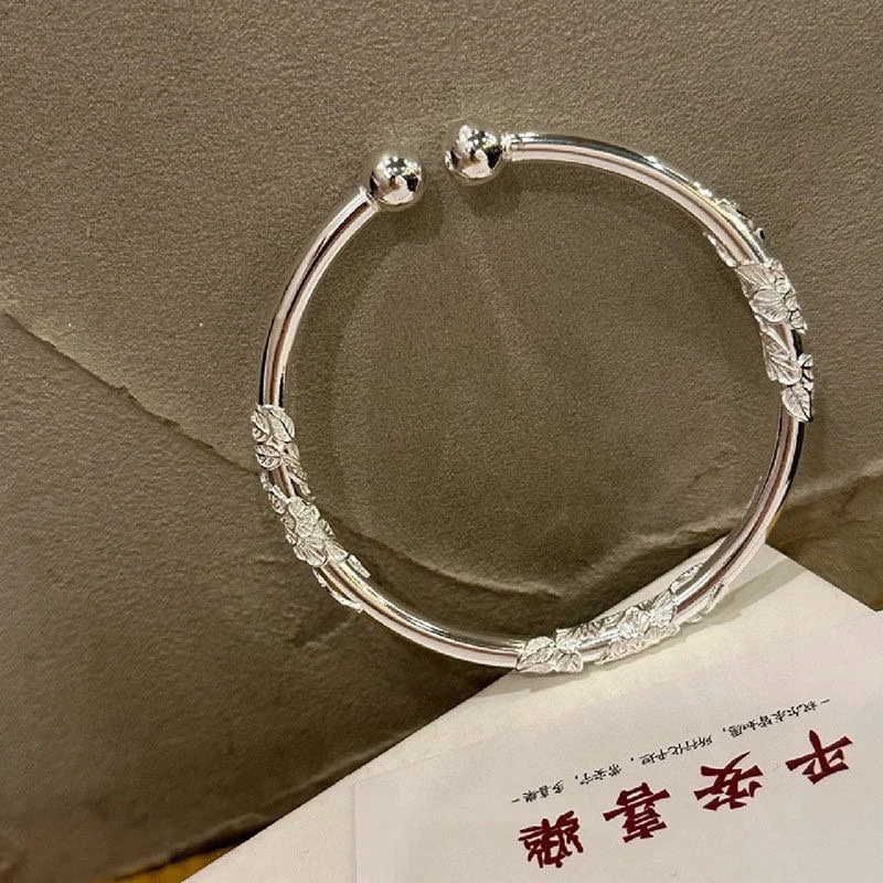足银手镯 假一赔十足银9999亮面繁花开口手镯