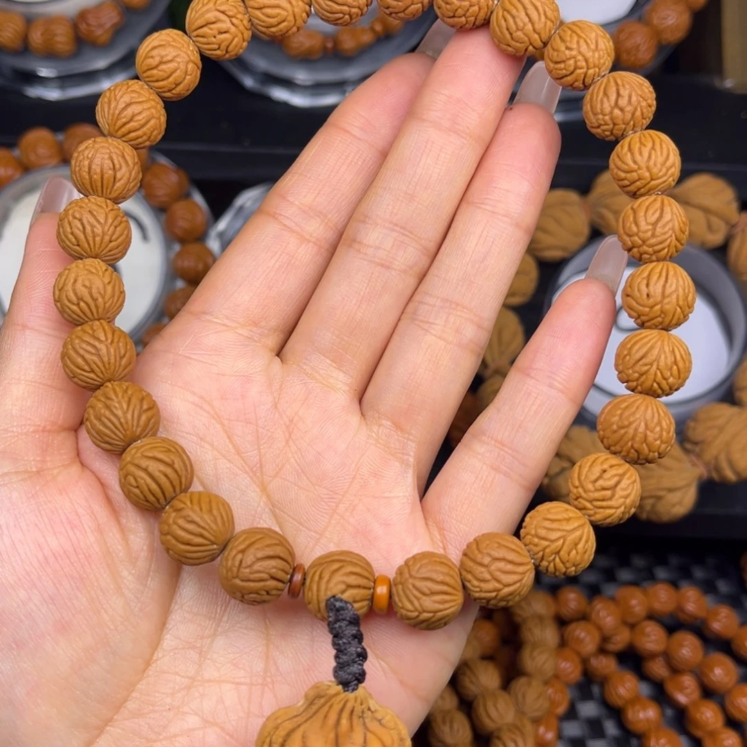 桃核吊坠柳叶纹手持