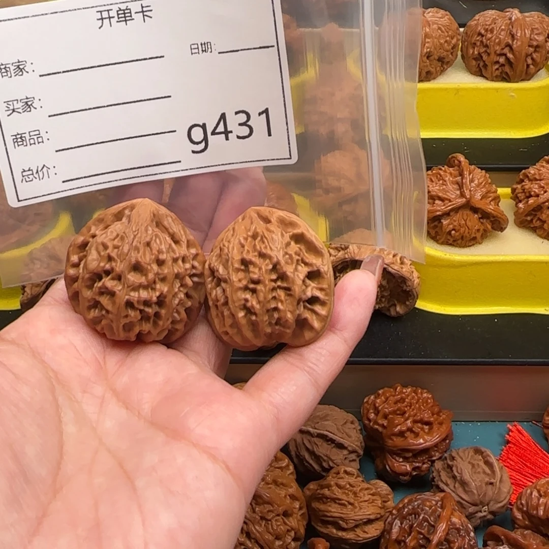 㞮***孞把件桃核文玩的好