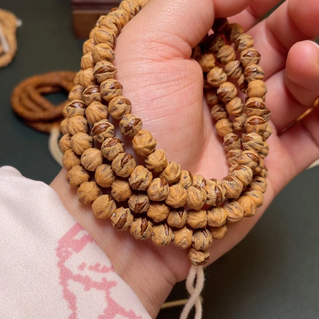 柏香籽/百香籽吊坠李*鹏红牙横打长串