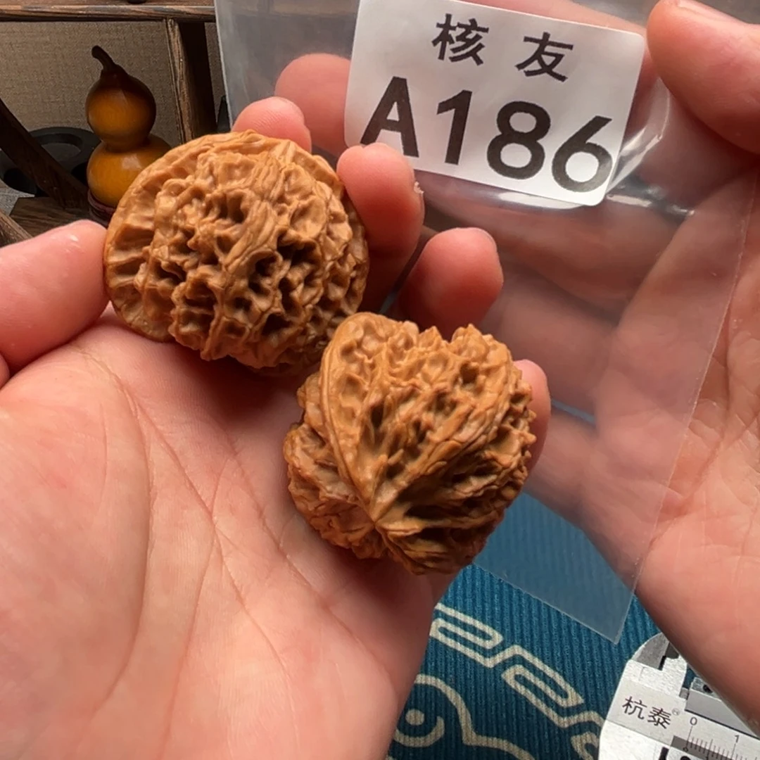 S***n吊坠文玩核桃苹果圆