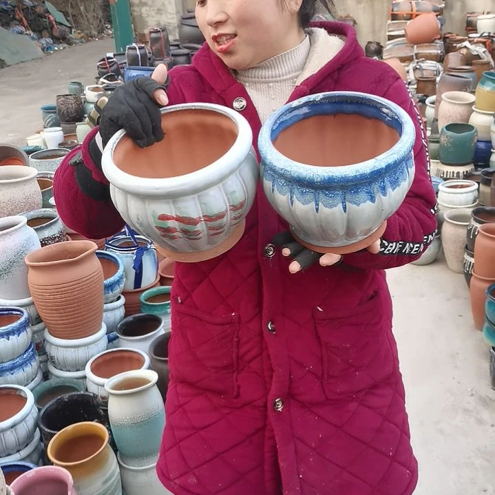 红陶口18高16瑕疵两个口裂