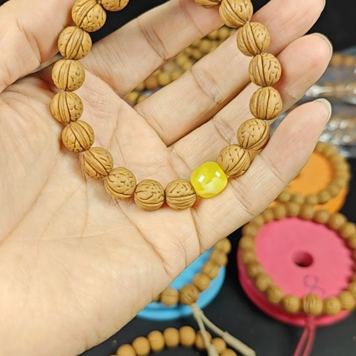 海***鸟一线脐桃核的手串