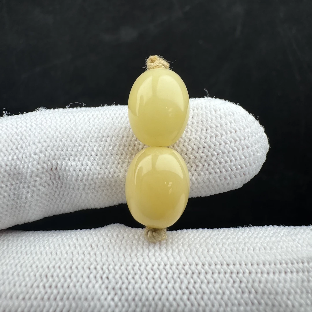 K2658天然原矿蜜蜡 对珠9.4mm支持鉴定 假一罚十