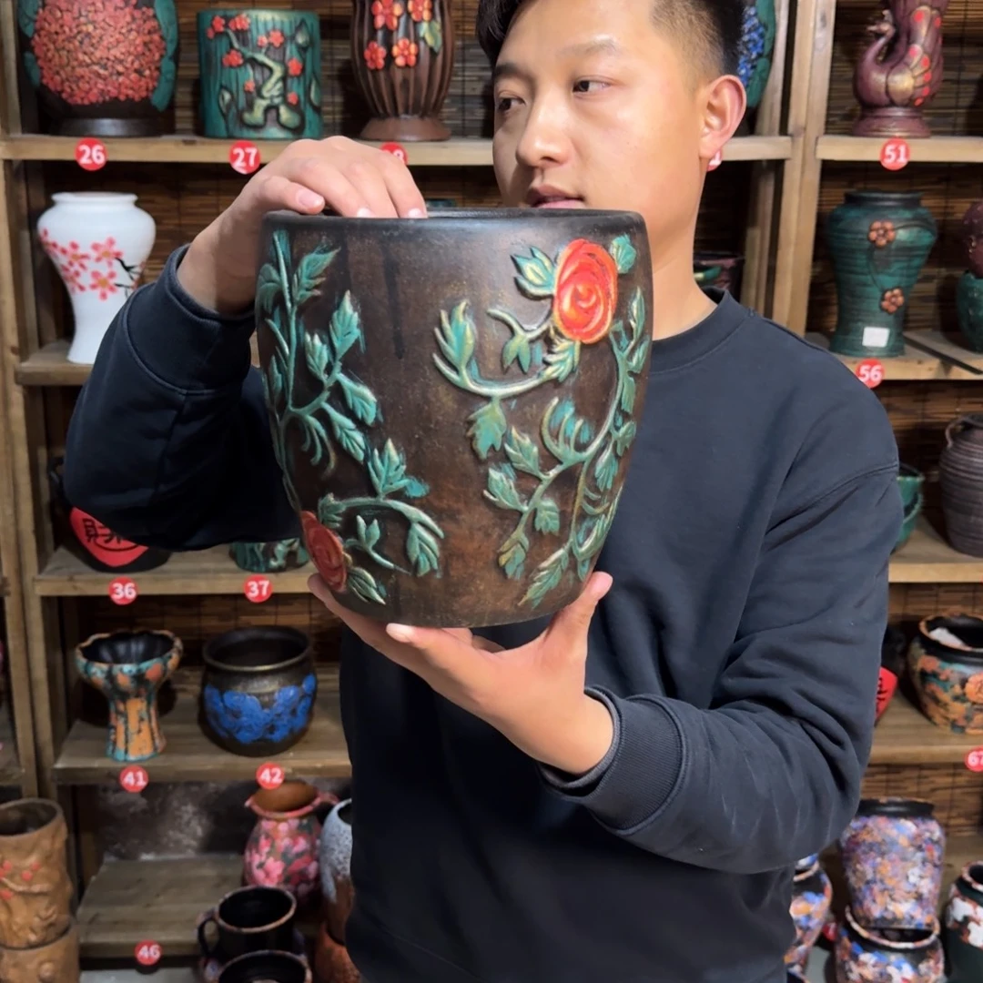 有孔红陶浮雕花盆炸炸炸