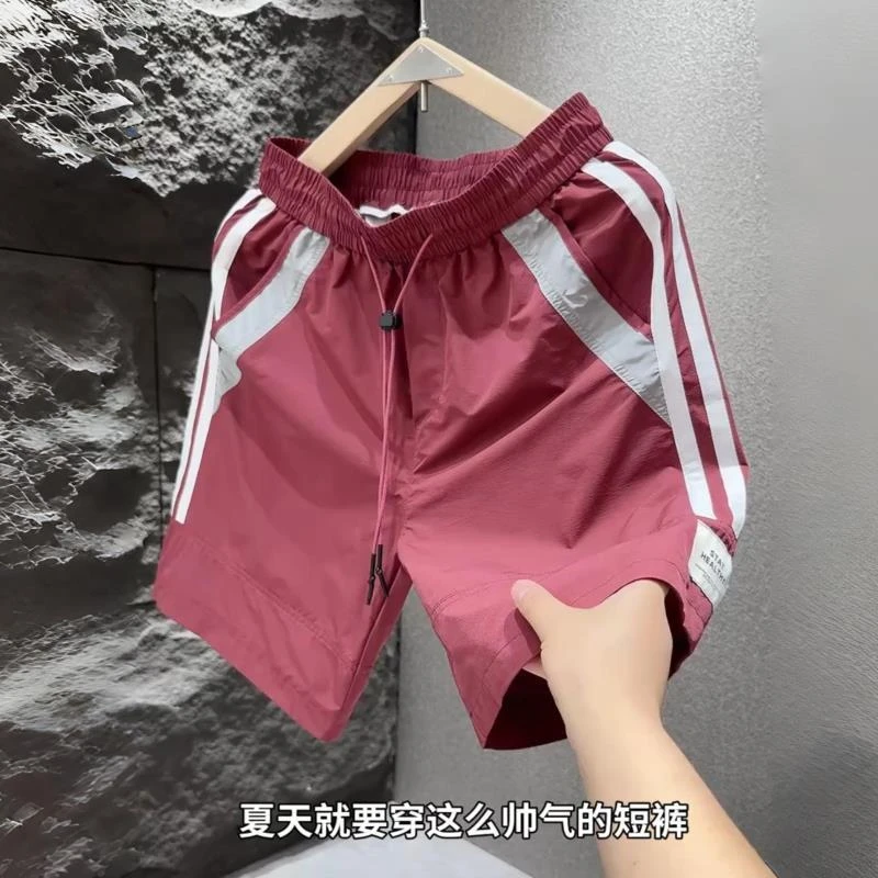 男士时尚潮流夏季速干百搭宽松条纹拼接撞色拼色印花梭织短裤运动