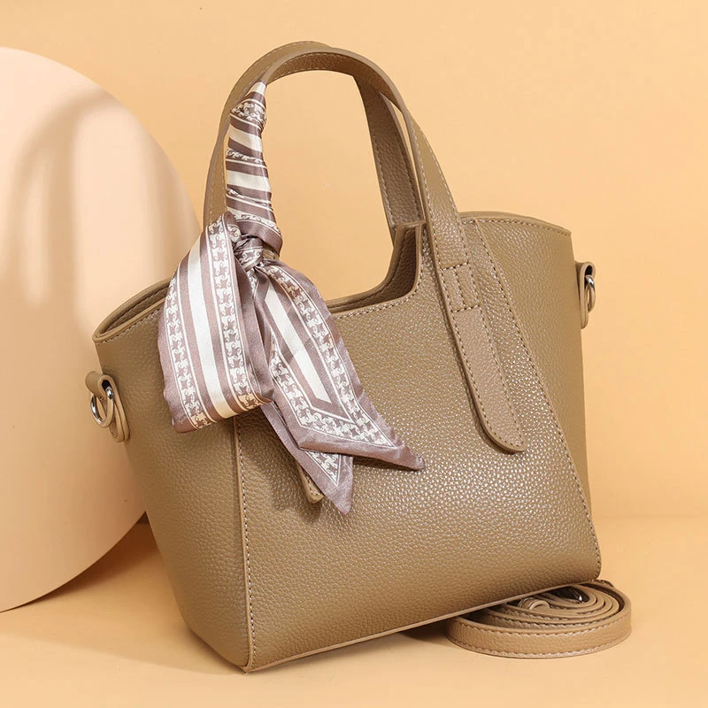 真皮手提包女春季新款时尚高级感女士水桶包包质感百搭通勤单肩包