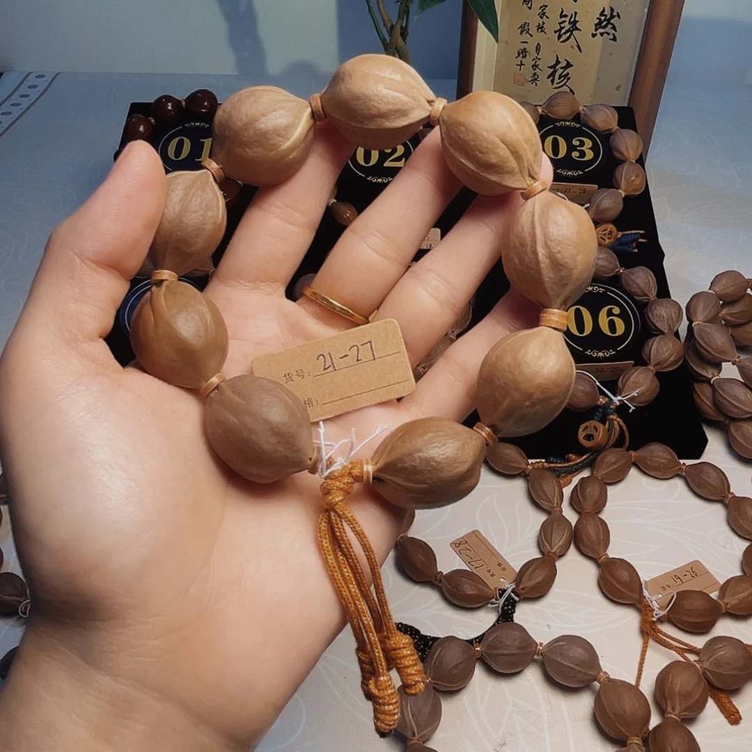 阿***李橄榄核手串梅林铁核21*27