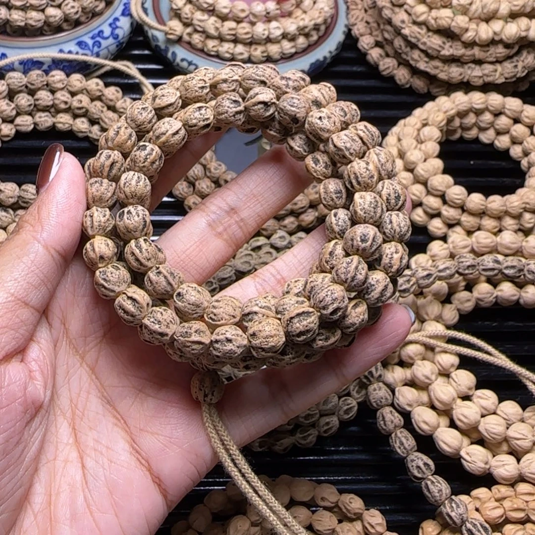 谭***鱼柏香籽/百香籽吊坠