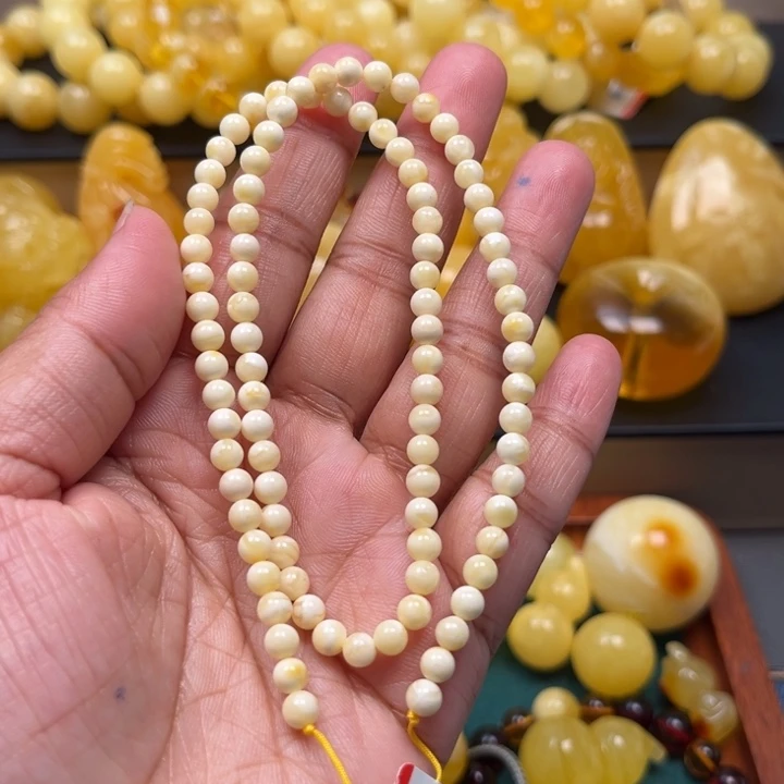 琥珀未镶嵌珠宝奇石M1000号4.6+浓白多圈