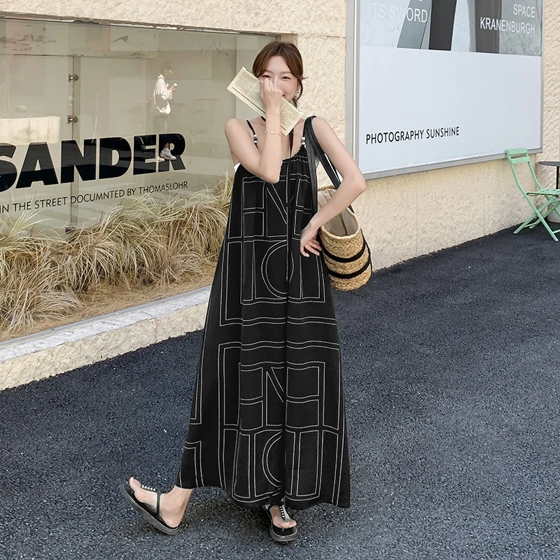 撞色超好看黑色吊带连衣裙女2025夏季新款今年流行爆款显瘦长裙子